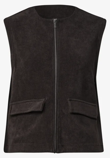 Vest met ronde hals in corduroy-look black coffee Mouwloze donkerbruine suède gilet met ritssluiting voor en twee klepzakken.