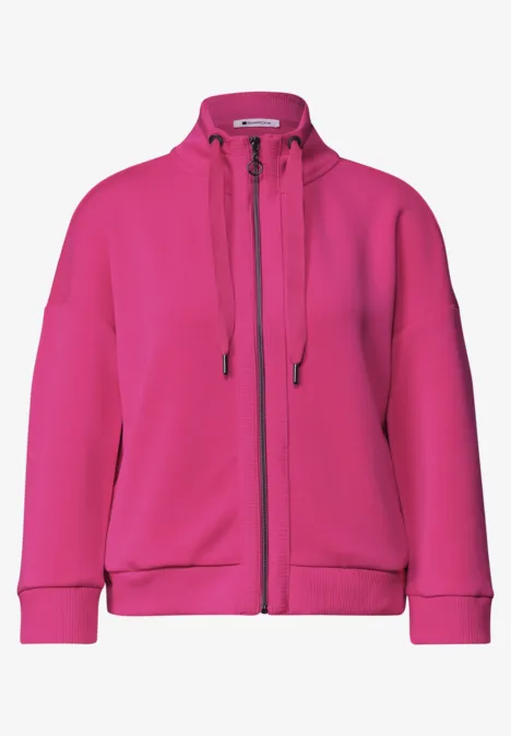 Veste à capuche rose vif zippée avec poches kangourou.