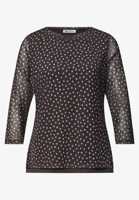 Shirt met 3/4-mouwen van mesh met print black coffee Zwart damesshirt met transparante 3/4-mouwen en wit hartdessin.