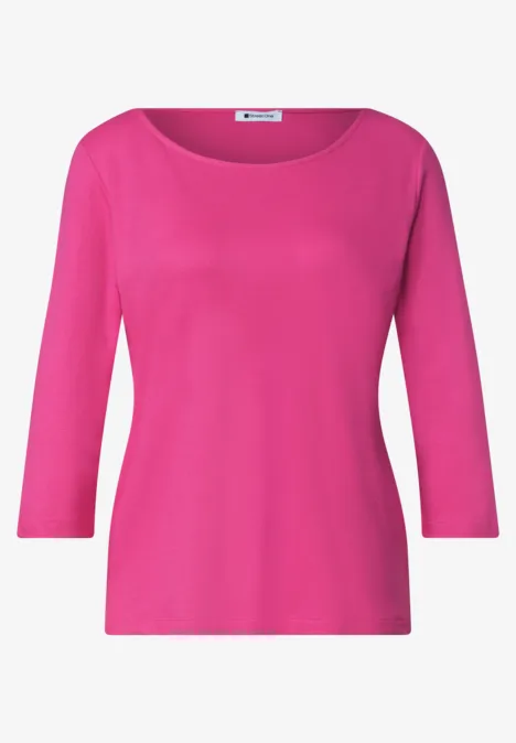 Felroze top met driekwartmouwen en ronde hals