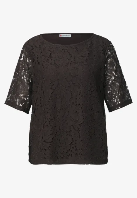 Schwarze Spitzenbluse mit halblangen Ärmeln und rundem Ausschnitt.