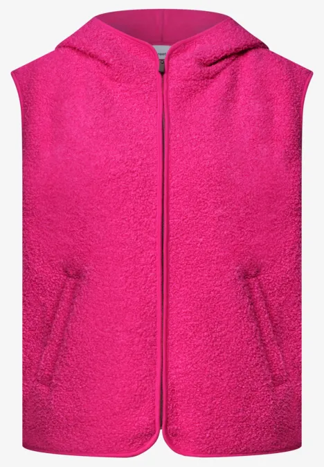Mouwloos teddy gilet in felroze met capuchon en volledige ritssluiting