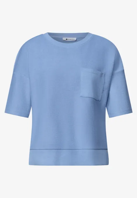 Shirt met ronde hals en textuur northern blue Lichtblauw T-shirt met korte mouwen, ronde hals, borstzakje en losse pasvorm.