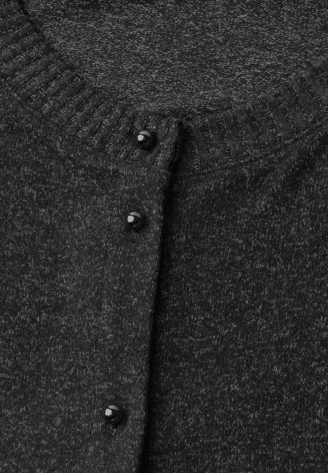 Schwarzer, leicht glitzernder Strickcardigan mit rundem Ausschnitt und kleinen Knöpfen vorne.