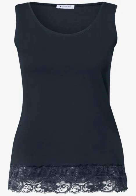 Débardeur noir pour femme avec délicate dentelle en bas.