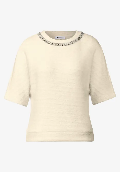 T-Shirt mit Rundhals und Schmucksteinen pure beige Cremefarbener kurzärmliger Pullover mit feiner Struktur und Rundhalsausschnitt.