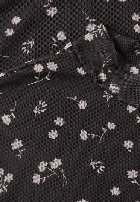 Schwarzer Stoff mit zartem weißen Blumenmuster