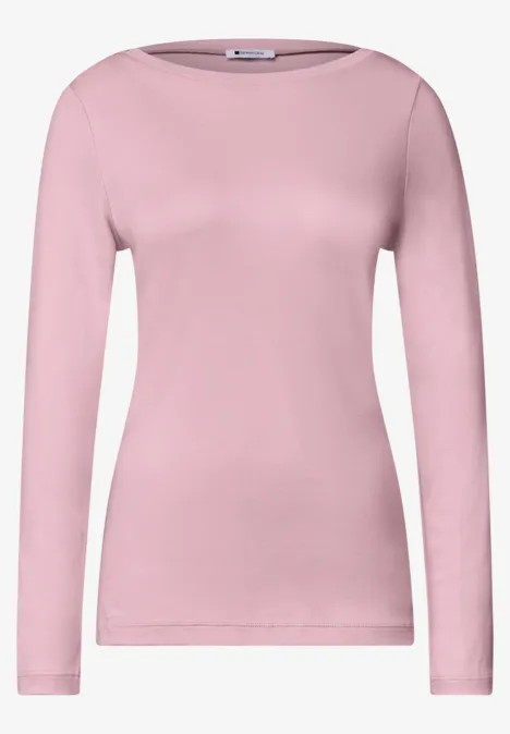 T-shirt femme à manches longues, épuré, coloris rose pastel.