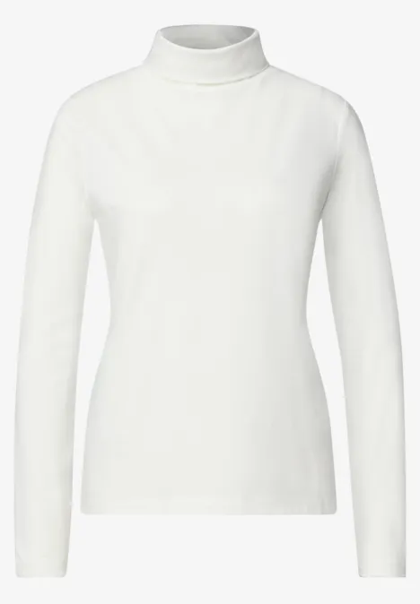 Col roulé blanc à manches longues pour femme, coupe ajustée.