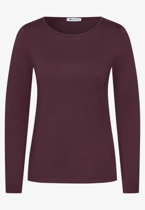 T-shirt femme uni manches longues violet foncé, col rond.