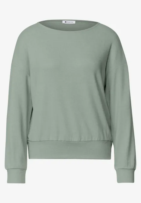 T-shirt à manches longues avec ourlet élastiqué eucalyptus green mel. Schlichtes, hellgrünes Sweatshirt mit Rundhalsausschnitt und langen Ärmeln.