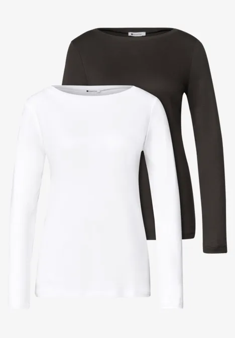 Zwei langärmlige T-Shirts, eins in Weiß und eins in Schwarz, schlichtes, enganliegendes Design.