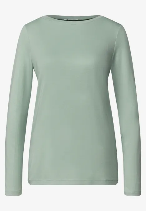 Schlichtes, hellgrünes Damen-Langarmshirt mit Rundhalsausschnitt.