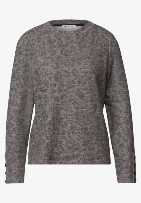 Pull gris à motif floral discret, manches longues, coupe décontractée.