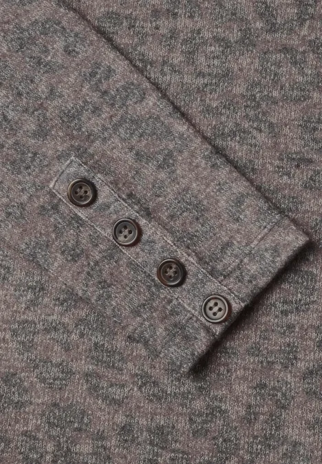 Tissu gris chiné avec quatre boutons marron