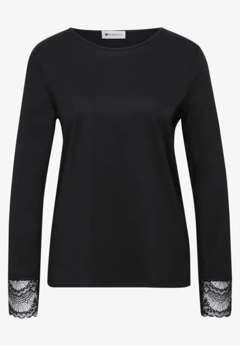 Langarm Shirt mit Rundhals und Spitze Black Schwarzer Langarm-Pullover mit Rundhalsausschnitt und Spitzenbesatz an den Ärmelenden.