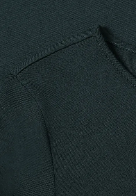 Langarm Shirt mit Rundhals und Spitze stormy green Dunkelgrüner Stoff mit sichtbarer Naht und einer abgerundeten Tasche
