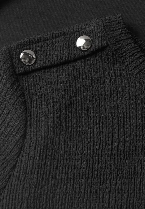 Langarm Shirt mit Struktur und Knöpfen Black Schwarzes, geripptes Oberteil mit silbernen Druckknöpfen an der Schulter.