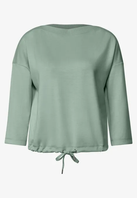 Groene blouse met driekwartmouwen en aantrekkoord onderaan