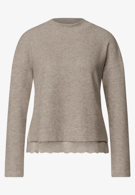 Beige trui met lange mouwen, ronde hals en gegolfde zoom