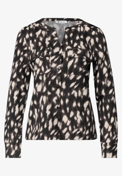 Langarm Shirt im Tunika-Look Black Schwarze Bluse mit cremefarbenem Tupfenmuster, V-Ausschnitt und langen Ärmeln.