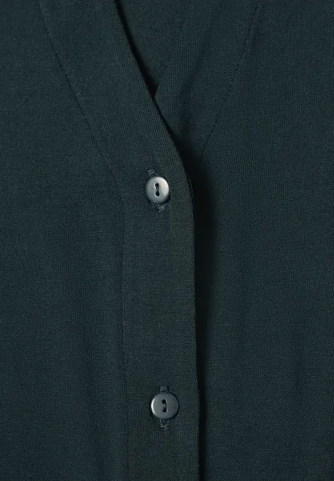 Shirt met lange mouwen in blouse-stijl stormy green Close-up van een donker vest met V-hals en knoopsluiting