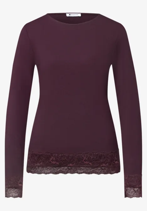 Shirt met lange mouwen, boothals en kant berry plum Paars damestrui met lange mouwen en kanten rand langs zoom en mouwuiteinden.