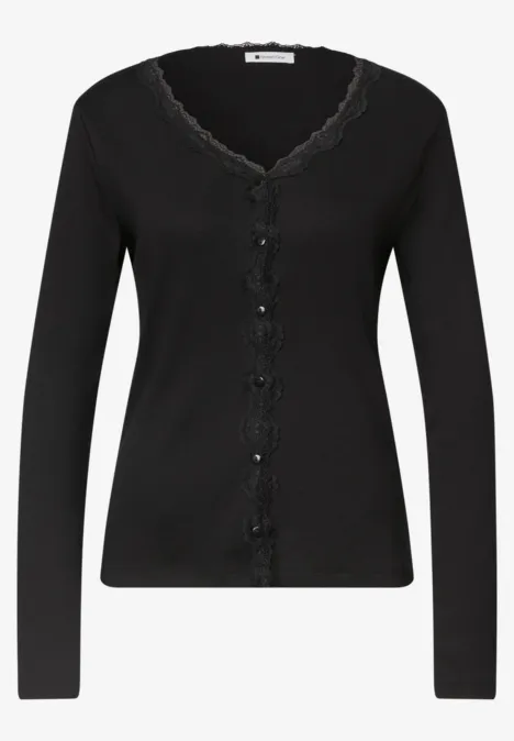 Jasje met fijne ribbel, V-hals en kant Black Zwarte damescardigan met V-hals, kanten rand en knopenrij.