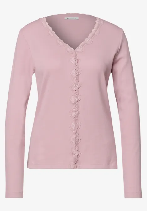 Jasje met fijne ribbel, V-hals en kant quiet rose Zartrosa Damenstrickjacke mit V-Ausschnitt, langen Ärmeln und verspielter Spitzenborte am Kragen und der Knopfleiste.