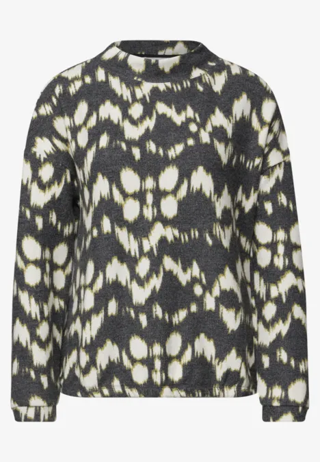 Shirt met lange mouwen, col en print Black Zwart-witte trui met abstract batik-/ikat-print, ronde hals en lange mouwen.