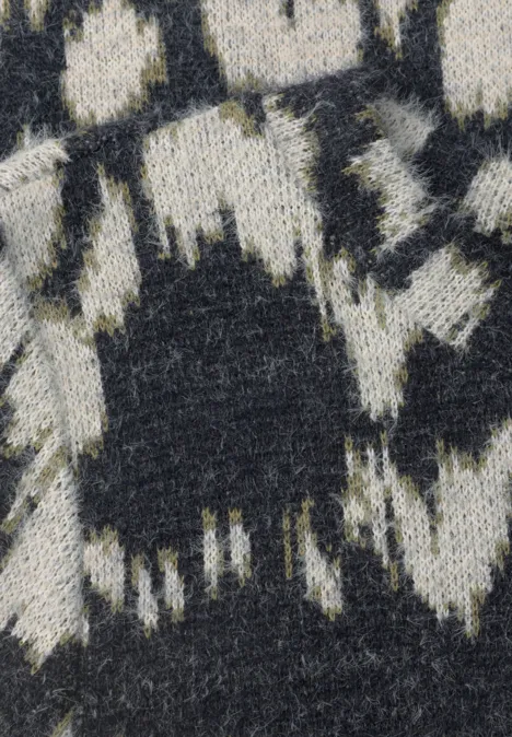 Tissu tricoté noir et blanc avec motif abstrait irrégulier