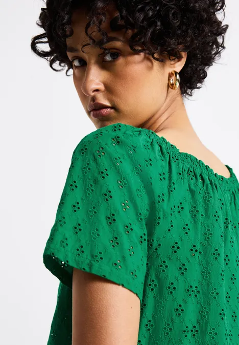 Bluse mit Lochstickerei glowing green