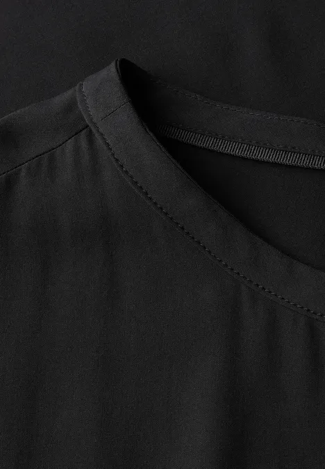 Bluse mit elastischem Saum Black