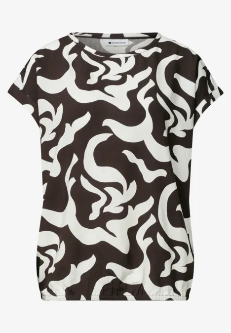 T-shirt noir avec motif abstrait blanc à formes ondulées