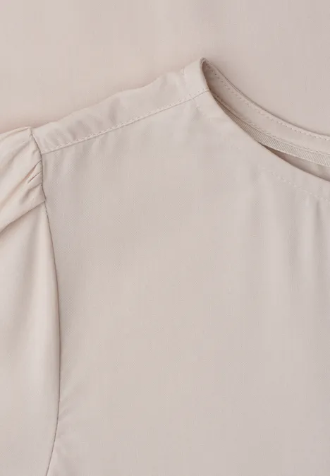 Beige damesblouse met ronde hals en geplooide mouwen