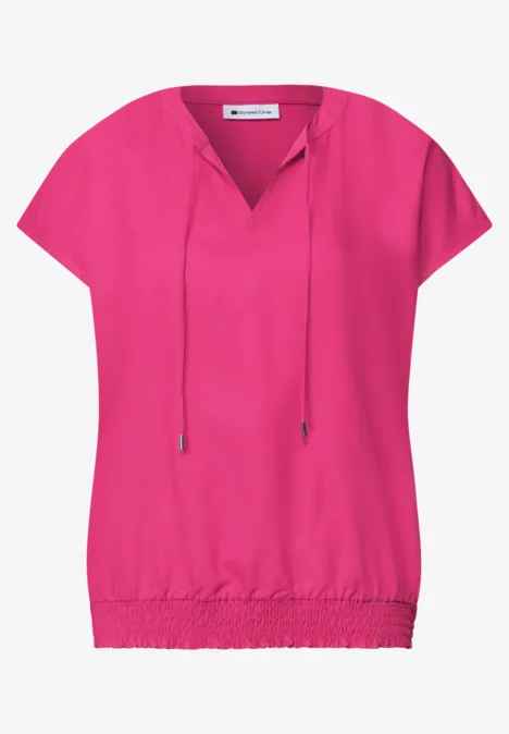 Roze blouse met korte mouwen, V-hals met trekkoord en elastische zoom.