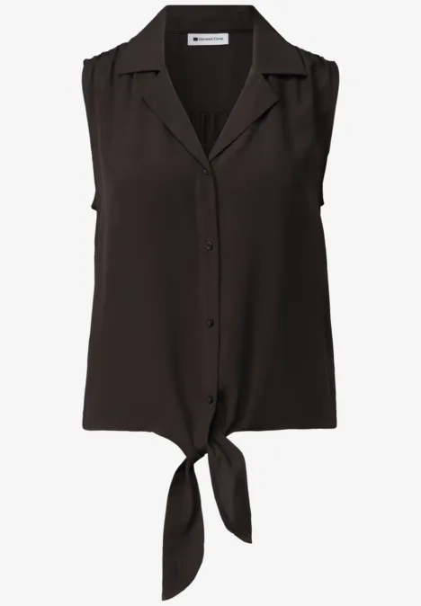 Ärmellose schwarze Bluse mit Hemdkragen, Knopfleiste und vorderem Knotendetail.