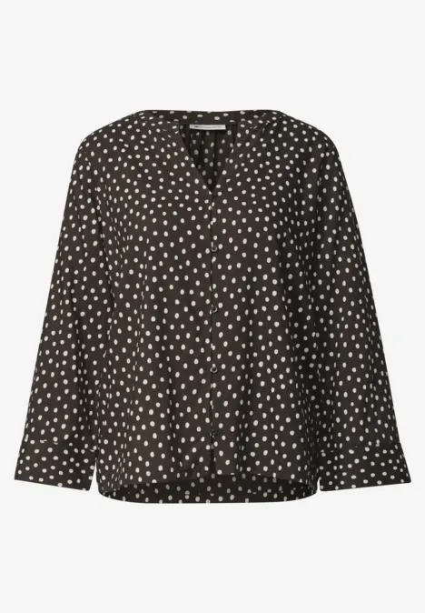 Schwarze Damenbluse mit V-Ausschnitt und weißem Herzmuster