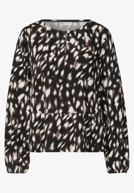 Chemisier à manches longues avec volant et imprimé cerf Black Blouse noire à motifs abstraits blancs, manches longues et coupe décontractée.