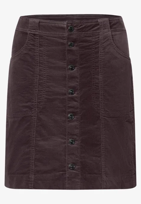 Jupe courte en velours côtelé marron, boutonnée devant, avec poches et passants de ceinture.