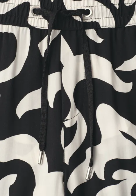 Zwart-wit abstract patroon, elastische taille met aantrekkoord.