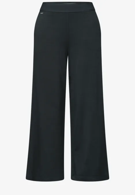 Zwarte, wijde palazzo-broek met hoge, elastische taille en rechte pijpen.