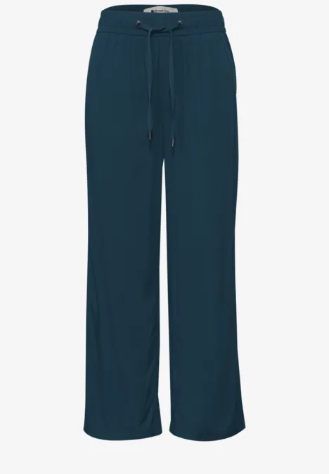 Weite, dunkelgrüne Damen-Hose mit Kordelzug und lockerer Passform