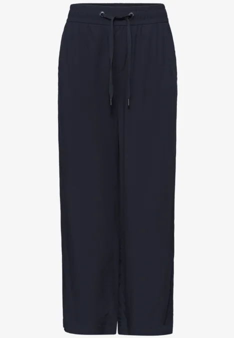 Dunkelblaue, gerade geschnittene Damenhose mit elastischem Tunnelzugbund.