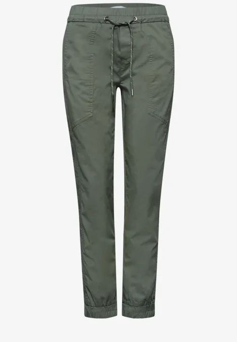 Grüne lässige Damenhose mit Tunnelzugbund und elastischen Bündchen, Slim-Fit.