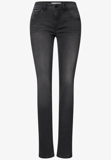 Zwarte slim-fit damesjeans met normale taille, vijf zakken en subtiele washed look.