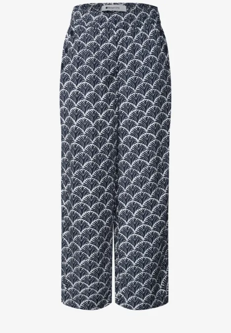 Weite, knöchellange Hose mit hohem Bund in Dunkelblau, weißes Fächer-Muster.