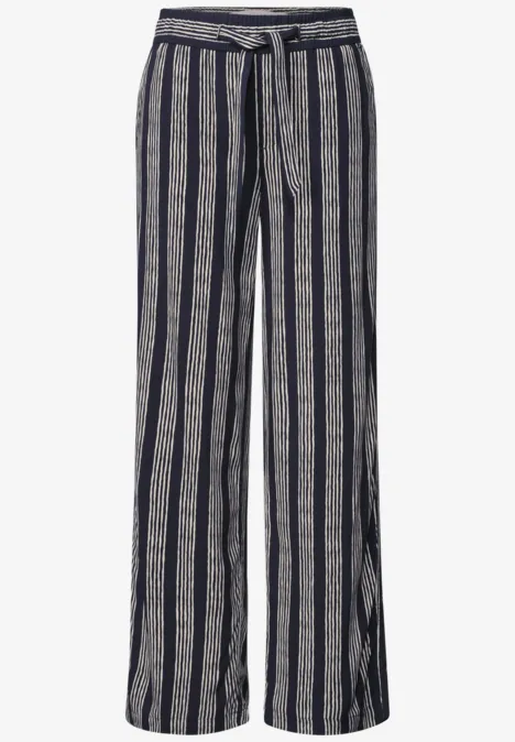 Pantalon ample en tissu à rayures bleu marine et blanc, taille haute et ceinture à nouer.