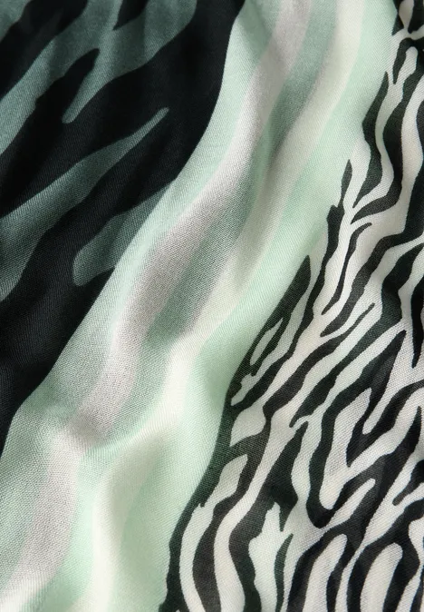 Gemusterter Loop Schal serene green