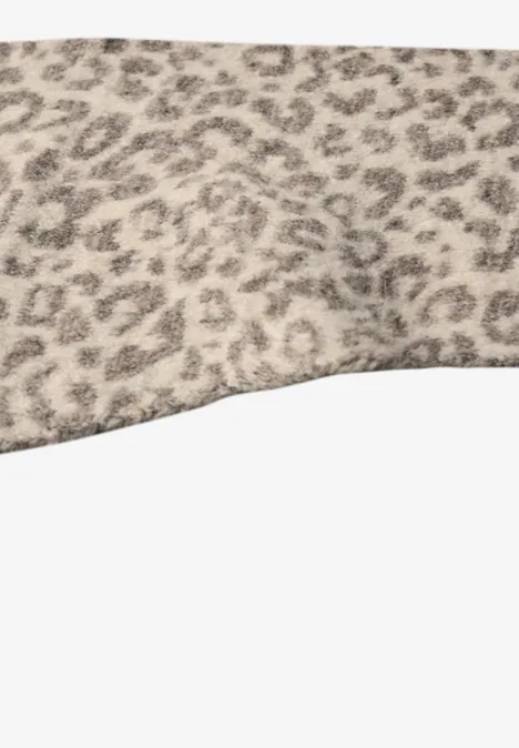 Écharpe triangulaire en jacquard à motif léopard barley beige mel.